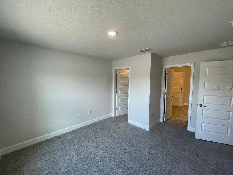 Spacious, unfurnished interior of a new home in Abbey Glen, Dade City (Image 22).