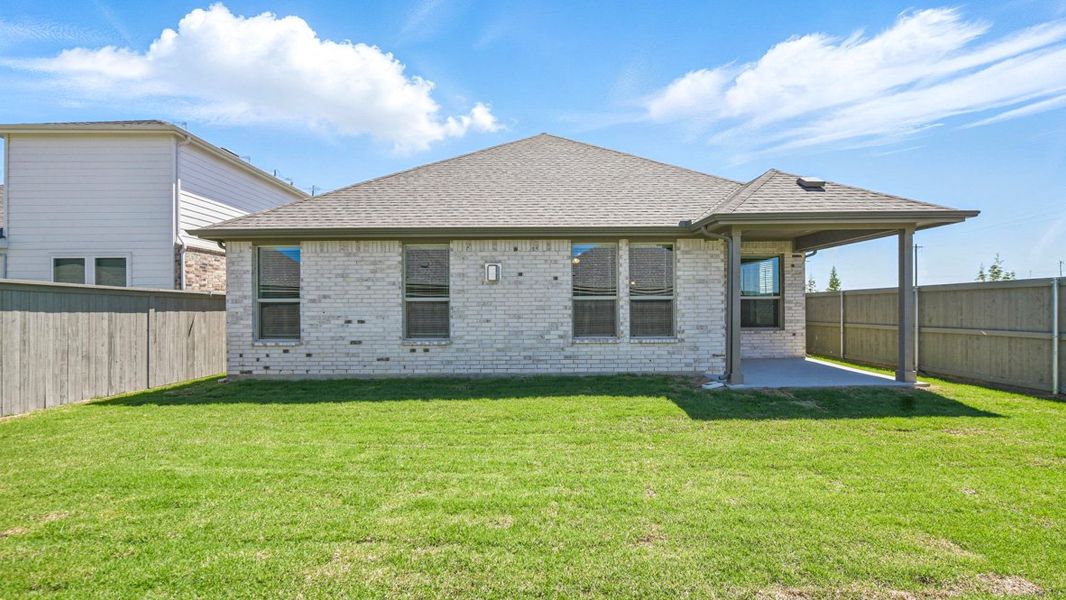 Representative exterior photo of a completed home built from the AVERY by D.R. Horton in Pecan Square, Northlake, TX (Image 22). Representative exterior photo of a completed home built from the AVERY by D.R. Horton in Pecan Square, Northlake, TX (Image 22).