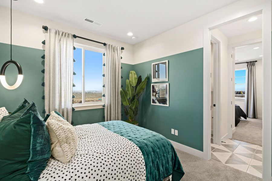 Representative furnished interior of a home built from the 4 by Trumark Homes in Festival at RainDance, Windsor (Image 29).