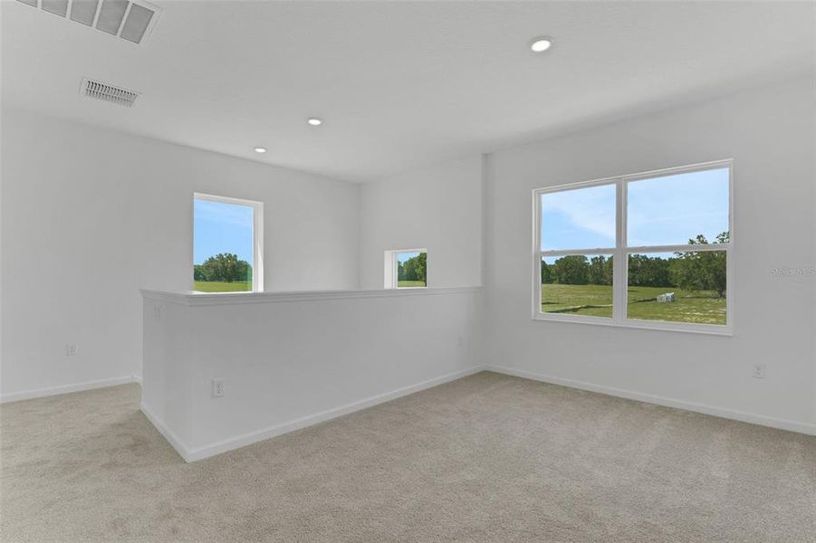 Spacious, unfurnished interior of a new home in Reserve at Hammock Oaks, Lady Lake (Image 14). Spacious, unfurnished interior of a new home in Reserve at Hammock Oaks, Lady Lake (Image 14).
