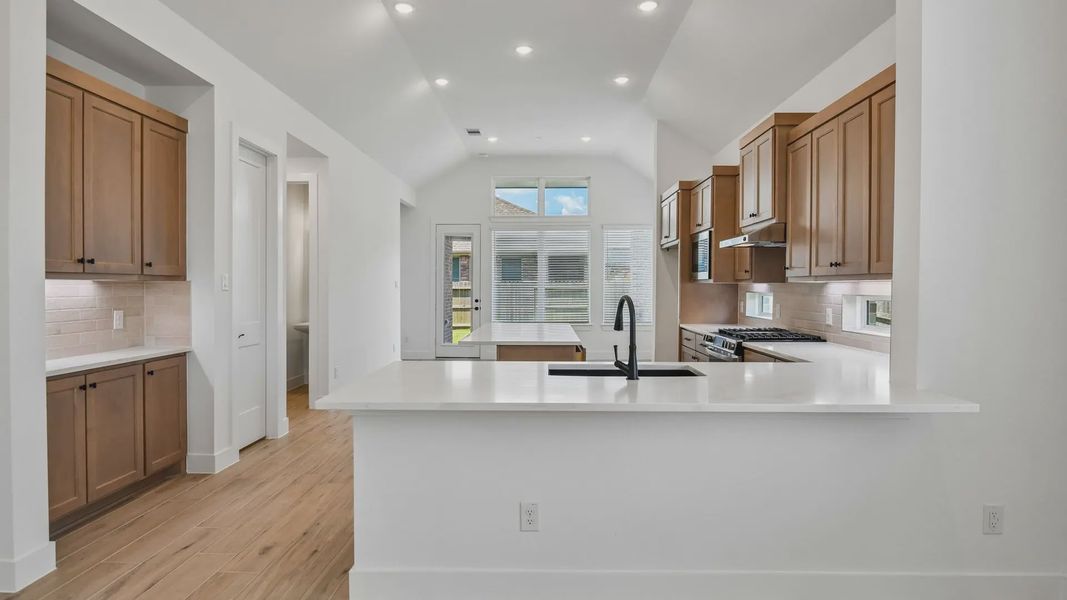 Furnished interior view inside a new home in Artavia, Conroe (Image 6).
