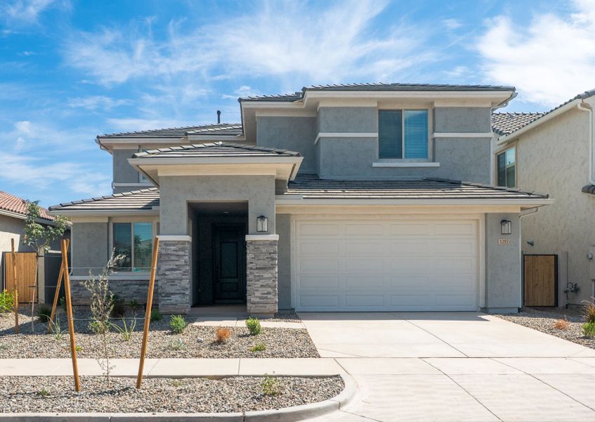 Front exterior of a new home in Blossom Rock, Apache Junction, AZ, highlighting curb appeal (Image 23).