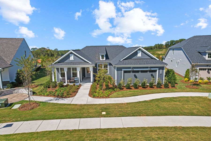 Representative exterior photo of a completed home built from the Stellar by Del Webb in Del Webb Carolina Ridge, Midland, NC (Image 31). Representative exterior photo of a completed home built from the Stellar by Del Webb in Del Webb Carolina Ridge, Midland, NC (Image 31).