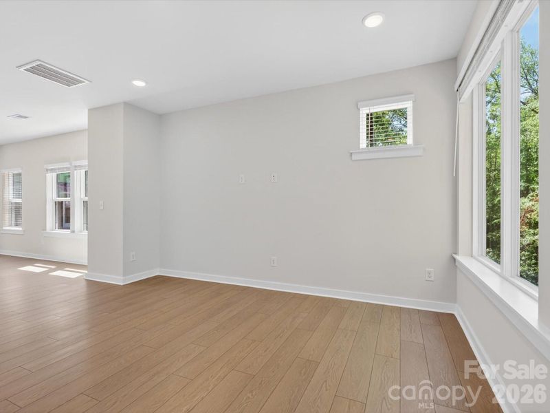 Spacious, unfurnished interior of a new home in Central Living at Craig, Charlotte (Image 20).