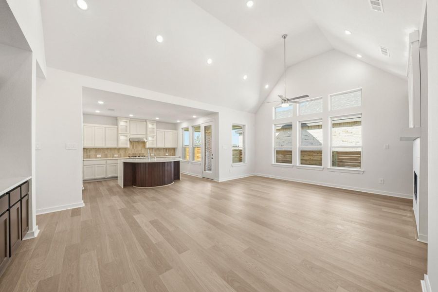 A beautifully designed kitchen open to the dining area and family room, creating a seamless flow for everyday living and entertaining. A beautifully designed kitchen open to the dining area and family room, creating a seamless flow for everyday living and entertaining.