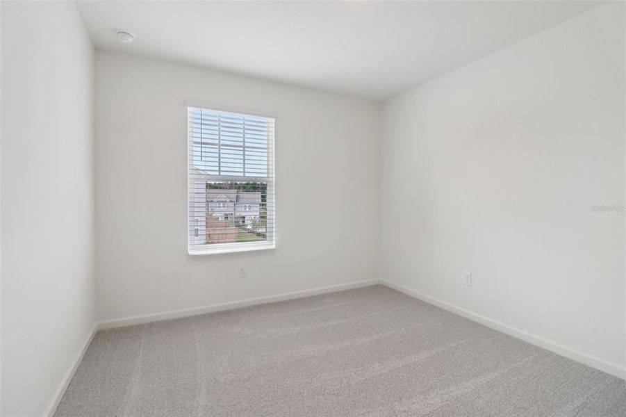Spacious, unfurnished interior of a new home in Temples Crossing, Davenport (Image 27).