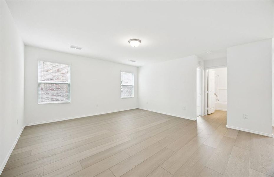 Spacious gathering room with large windows