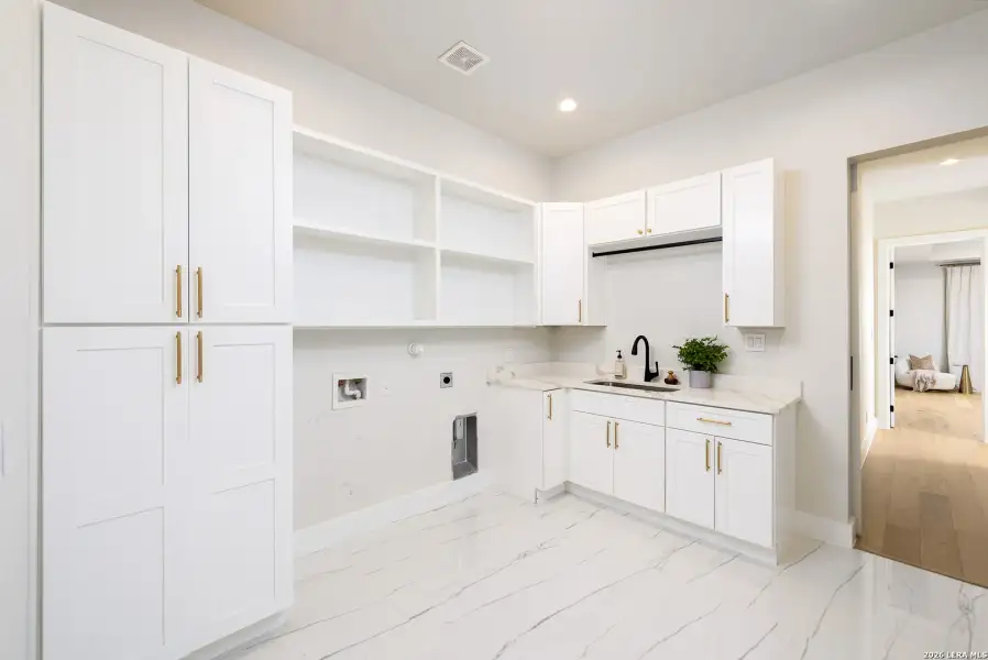 Furnished interior view inside a new home in , San Antonio (Image 52).