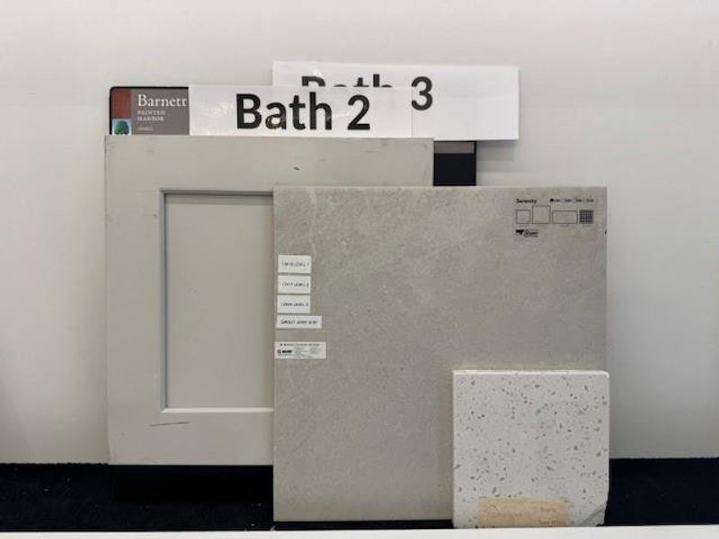 Quality finishes in the secondary bathrooms included linen cabinetry with quartz countertops Quality finishes in the secondary bathrooms included linen cabinetry with quartz countertops