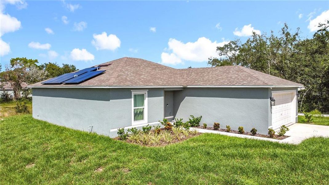 Front exterior of a new home in , Kissimmee, FL, highlighting curb appeal (Image 24). Front exterior of a new home in , Kissimmee, FL, highlighting curb appeal (Image 24).