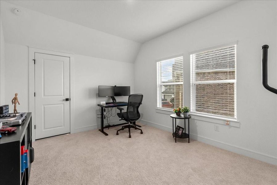 Upstairs secondary bedroom.