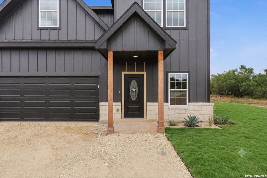 Exterior details and patio area of a home in , Devine (Image 31).