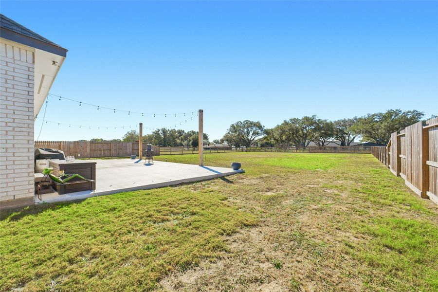 Exterior details and patio area of a home in Tejas Landing, Needville (Image 4).