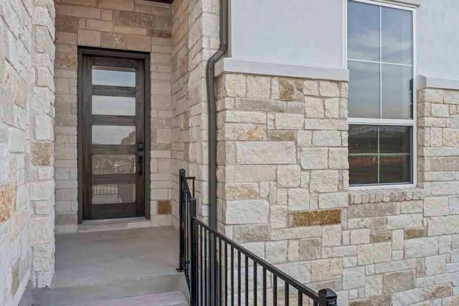 Exterior details and patio area of a home in Capitol Collection at Lariat, Liberty Hill (Image 3). Exterior details and patio area of a home in Capitol Collection at Lariat, Liberty Hill (Image 3).