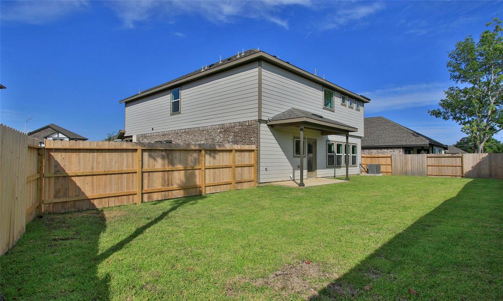 Front exterior of a new home in Ellis Cove, Seabrook, TX, highlighting curb appeal (Image 16).
