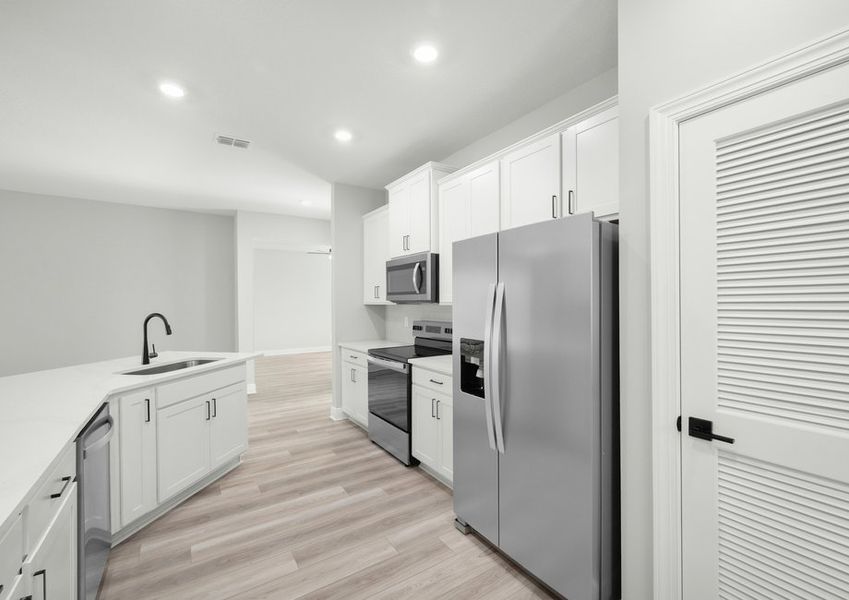 This kitchen comes with designer upgrades and stainless steel appliances