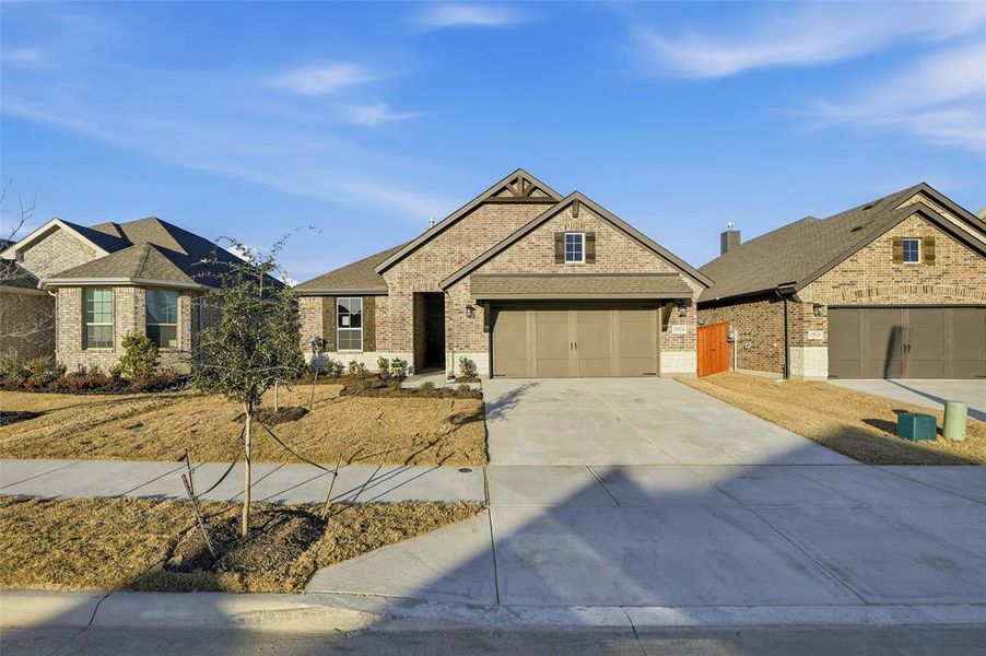 Front exterior of a new home in Morningstar, Aledo, TX, highlighting curb appeal (Image 20).