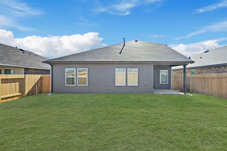 Exterior details and patio area of a home in Porters Mill, New Caney (Image 15).