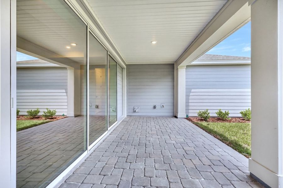 Exterior details and patio area of a home in Headwaters at Lofton Creek, Yulee (Image 3).