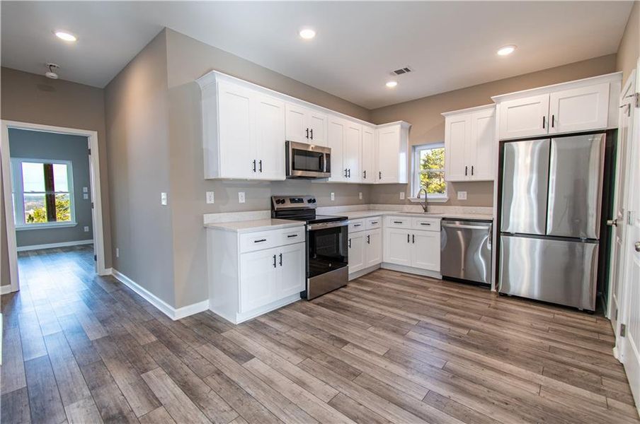 Furnished interior view inside a new home in , Fairmount (Image 9).