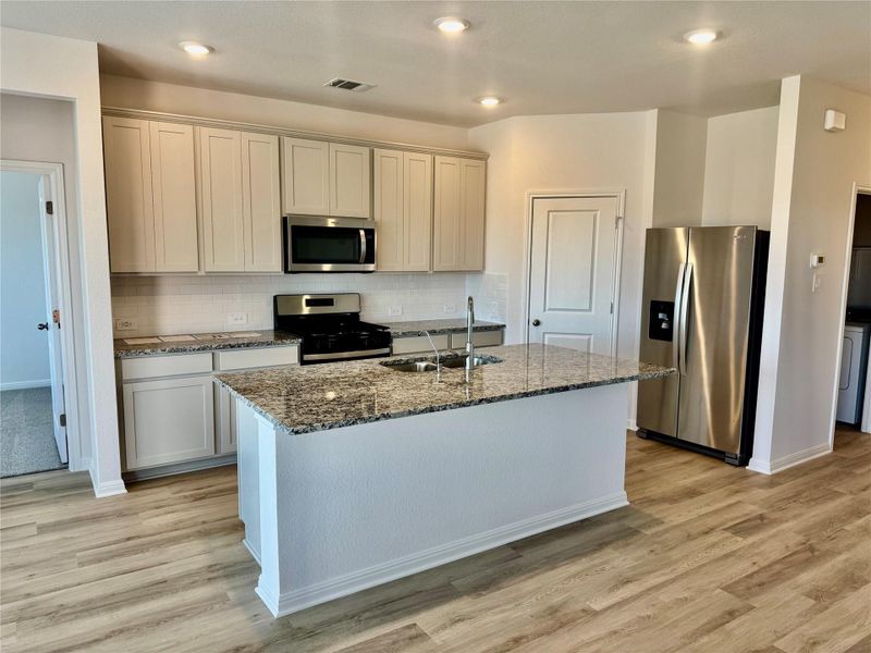 Furnished interior view inside a new home in Waterstone Crossing, Kyle (Image 5). Furnished interior view inside a new home in Waterstone Crossing, Kyle (Image 5).