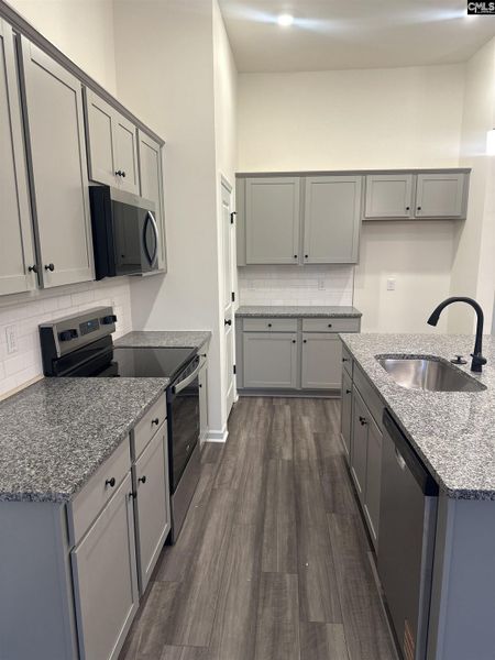 Furnished interior view inside a new home in Piney Woods Bluff, Columbia (Image 7).