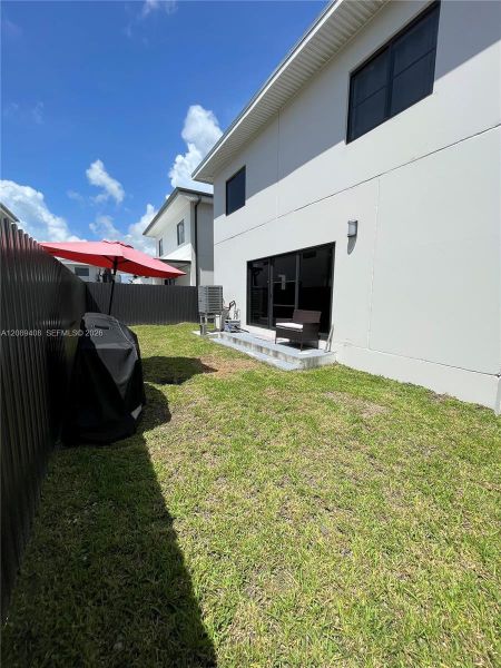 Exterior details and patio area of a home in , Florida City (Image 35).