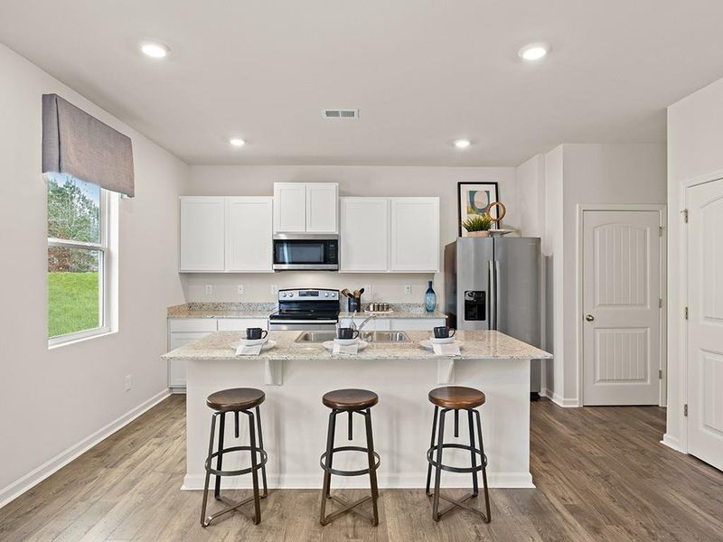 Furnished interior view inside a new home in Oaks at Cedar Grove, Fairburn (Image 22).