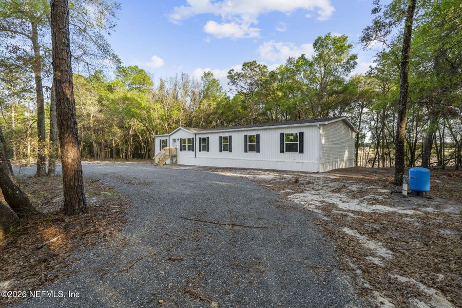 Exterior details and patio area of a home in , Keystone Heights (Image 27).