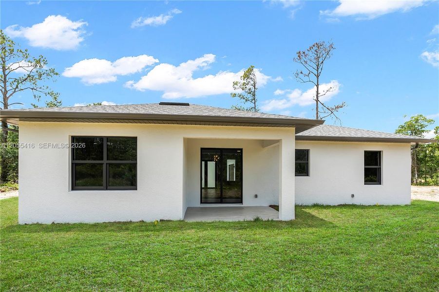 Exterior details and patio area of a home in , Sebring (Image 4). Exterior details and patio area of a home in , Sebring (Image 4).