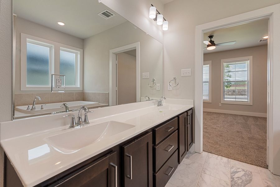 Representative furnished interior of a home built from the Isibelle by Heritage Towne in Heritage Towne, Midlothian (Image 11).