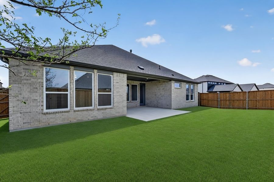 Exterior details and patio area of a home in South Oak, Lakewood Village (Image 3).