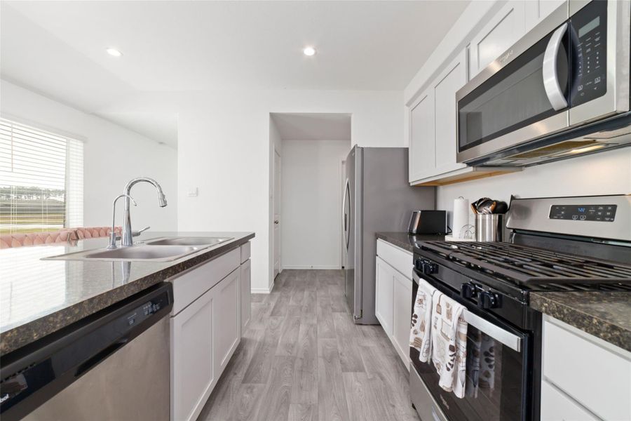 Furnished interior view inside a new home in Breckenridge Forest, Spring (Image 8). Furnished interior view inside a new home in Breckenridge Forest, Spring (Image 8).