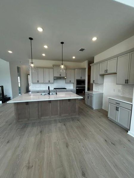 Furnished interior view inside a new home in Parmer Ranch, Georgetown (Image 6).