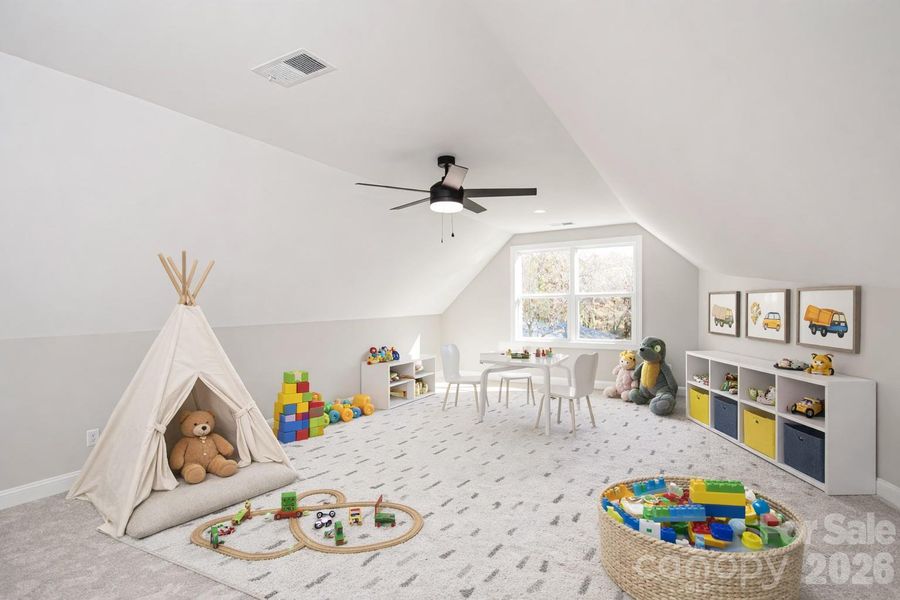 Expansive bonus room is located on the second level and features a ceiling fan, full bathroom, and a flex room that can be used as a craft room, office, workout space, storage, and more.