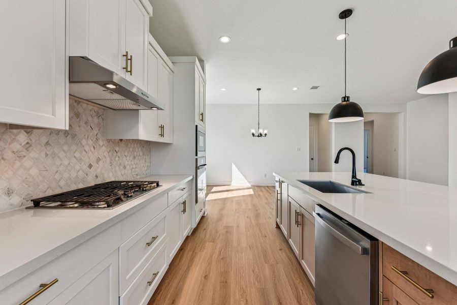 Furnished interior view inside a new home in 6 Creeks, Kyle (Image 9).