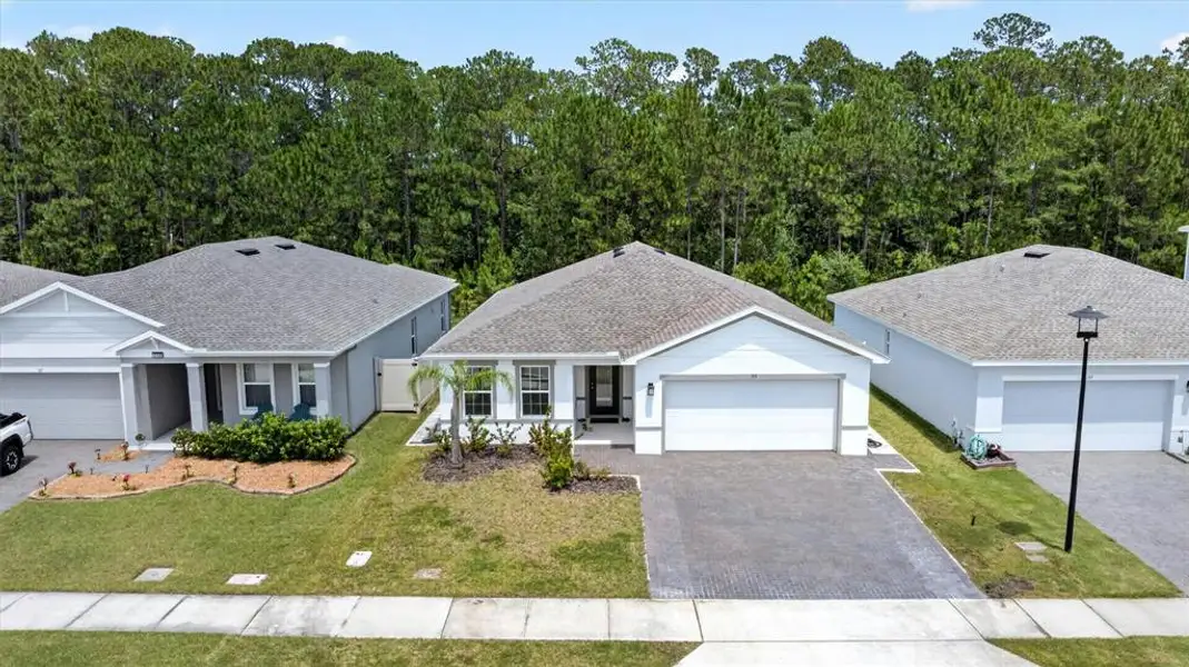 Front exterior of a new home in , Daytona Beach, FL, highlighting curb appeal (Image 26). Front exterior of a new home in , Daytona Beach, FL, highlighting curb appeal (Image 26).