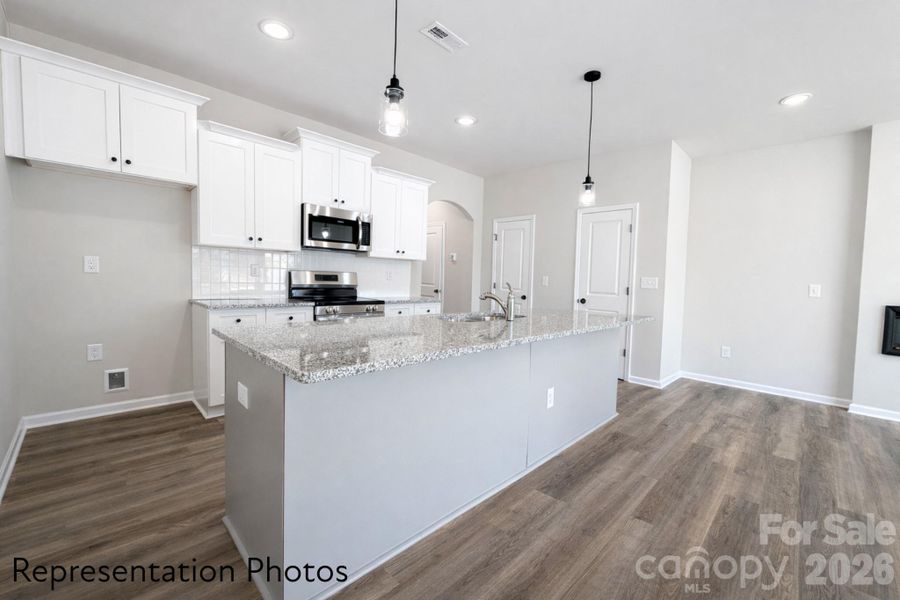 Furnished interior view inside a new home in , Charlotte (Image 8). Furnished interior view inside a new home in , Charlotte (Image 8).