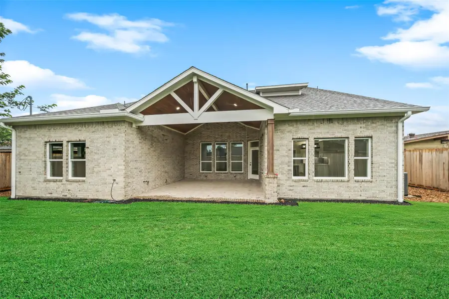Exterior details and patio area of a home in , Houston (Image 20).