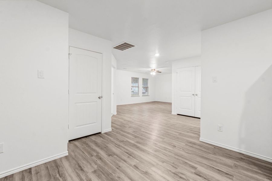 View from the kitchen looking into the main living area. View from the kitchen looking into the main living area.