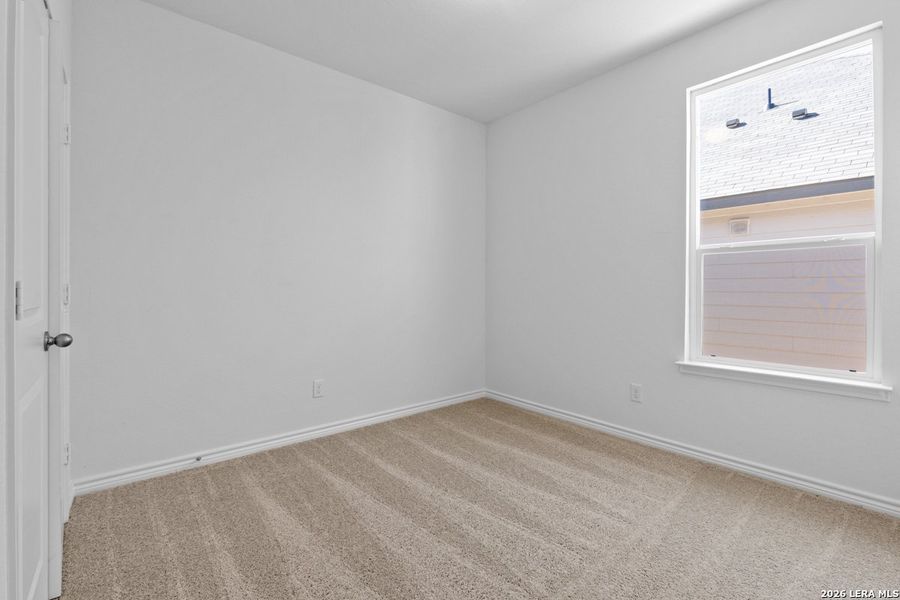Spacious, unfurnished interior of a new home in Hidden Bluffs at TRP, San Antonio (Image 24).