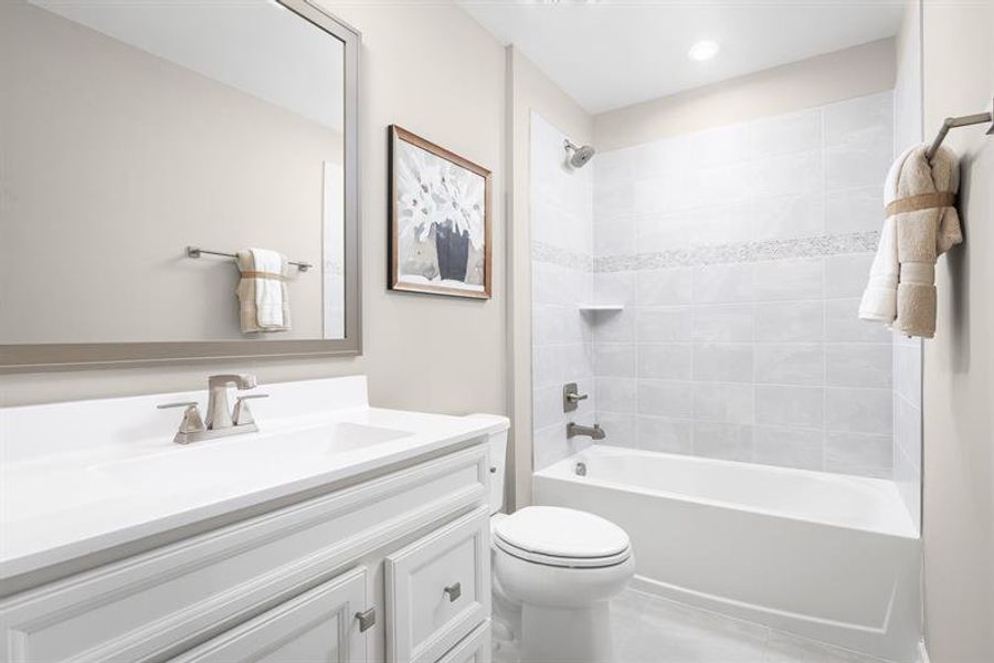 Representative furnished interior of a home built from the Nassau Cove Quick Move-In by Ryan Homes in Cobblestone at East Argent, Hardeeville (Image 13).