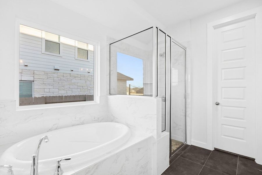 Furnished interior view inside a new home in The Colony, Bastrop (Image 11).
