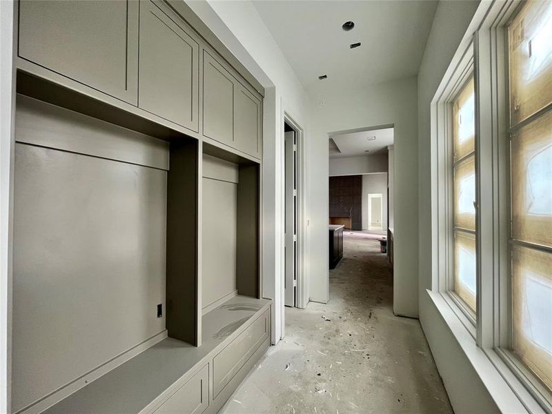 Mudroom with a fireplace