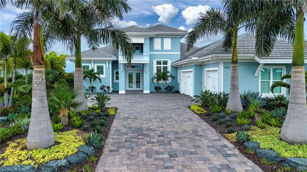 Front exterior of a new home in , Bradenton, FL, highlighting curb appeal (Image 1). Front exterior of a new home in , Bradenton, FL, highlighting curb appeal (Image 1).