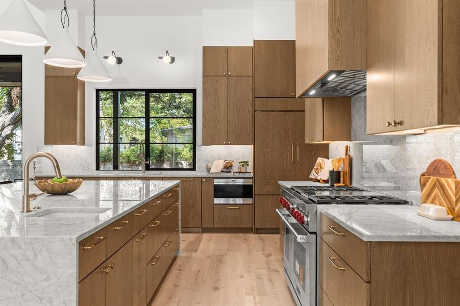 Wolf/Sub Zero appliance package with custom panels.