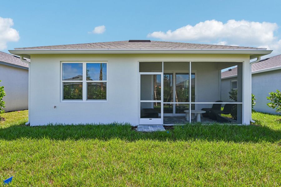 Exterior details and patio area of a home in Harbor Isle, Vero Beach (Image 31).