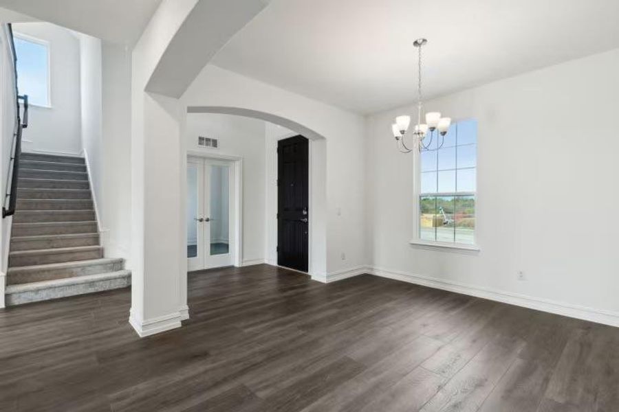 Photo of Pulte model home with same floor plan, not of actual home listed. Photo of Pulte model home with same floor plan, not of actual home listed.