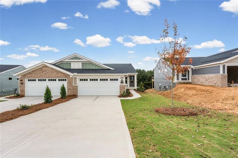 Front exterior of a new home in Villas at Gold Creek, Dawsonville, GA, highlighting curb appeal (Image 21).