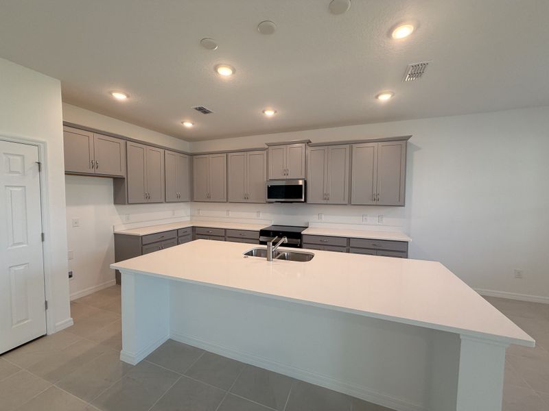 Furnished interior view inside a new home in Trinity Place, St. Cloud (Image 3).